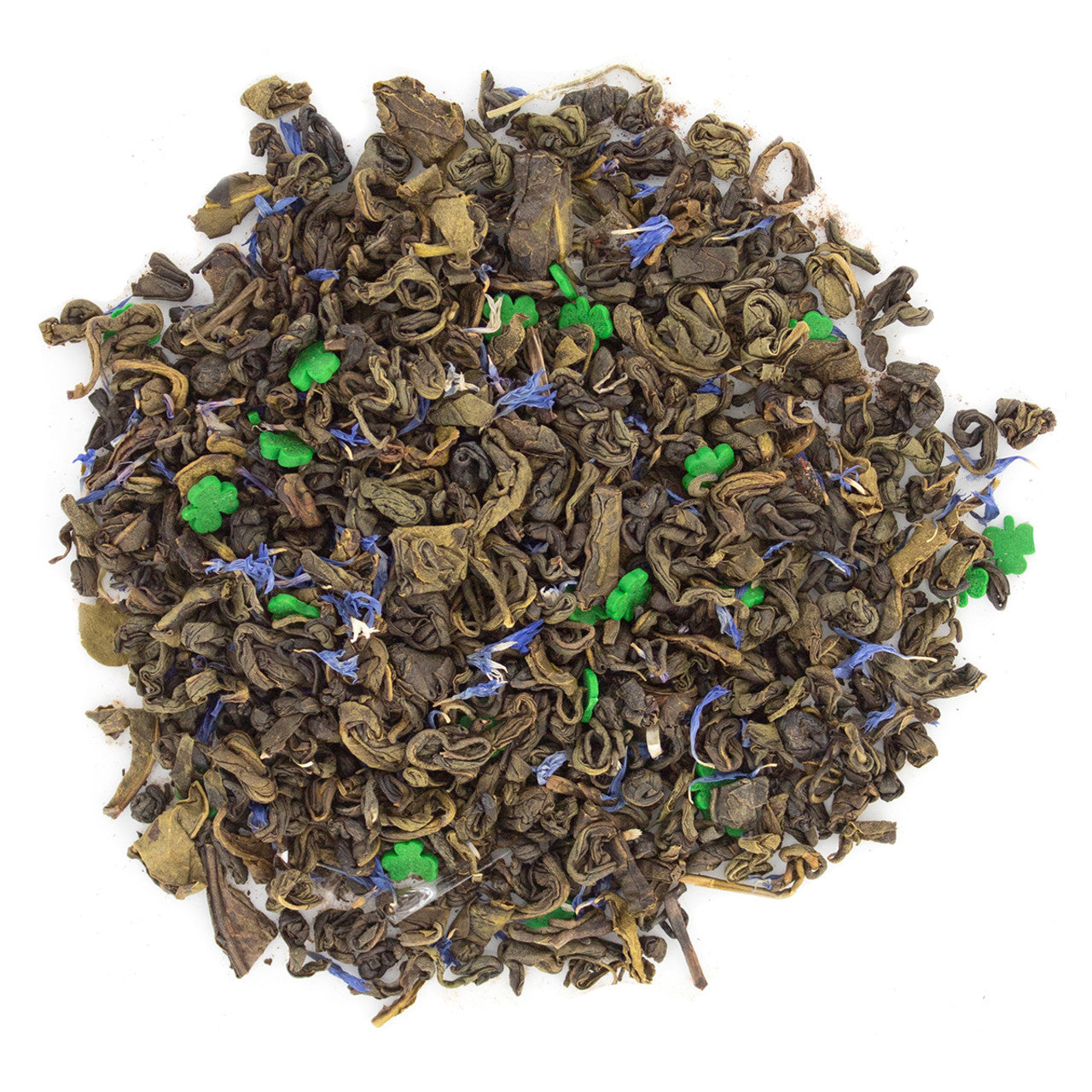 Dry tea leaves with green and blue accents on a white background