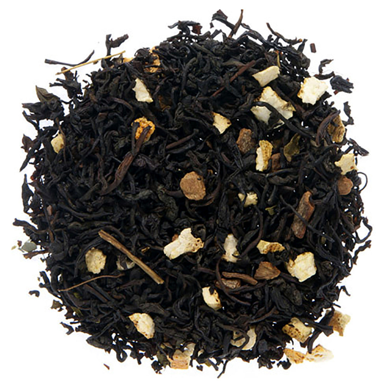 Black tea leaves with some intermixed dried fruit pieces on a white background