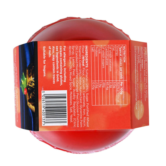 Bottom of a packaged Matthew Walker Classic Christmas pudding with red label and holly decoration featuring nutrition information.