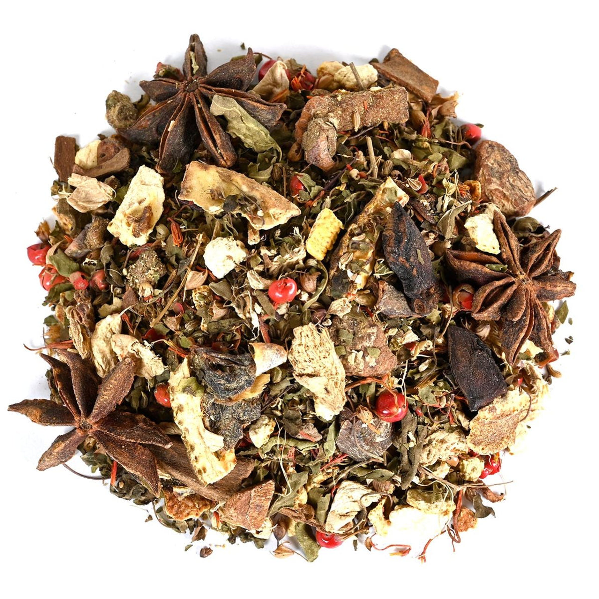 Assorted dried tea leaves, spices, and dried fruit pieces intermingled in a circle pile on a white background