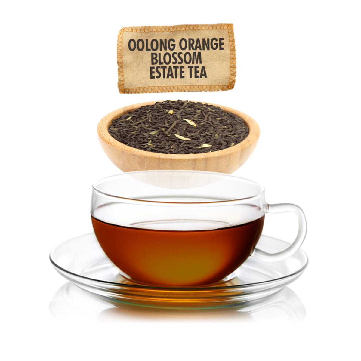 Glass cup of Oolong Orange Blossom Estate Tea with tea leaves in a wooden bowl and product label.