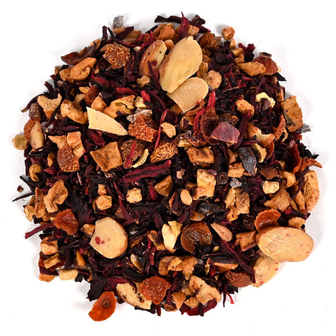 A pile of loose-leaf herbal tisane mixed with chunky dried fruit pieces