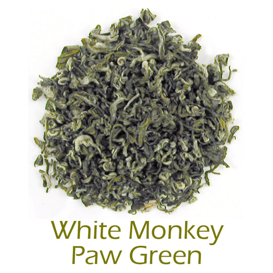 White Monkey Paw Green loose-leaf tea on a white background with product name caption
