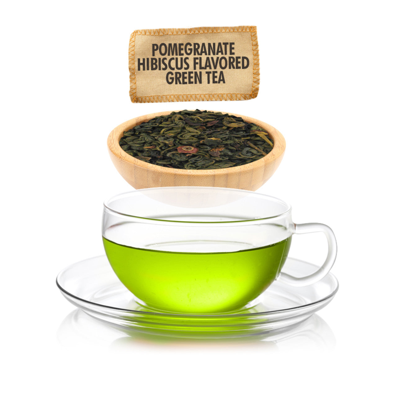 Glass cup of green tea with pomegranate hibiscus flavor, tea leaves in a bowl, and product label.