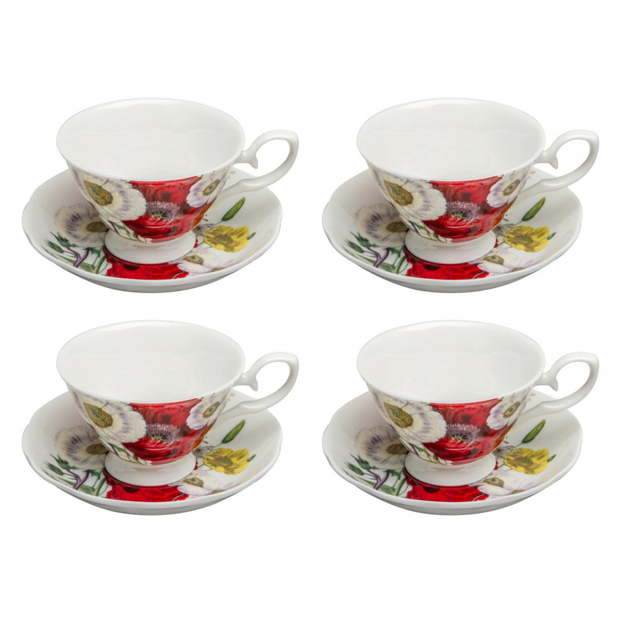 Set of four floral teacups and saucers on a white background