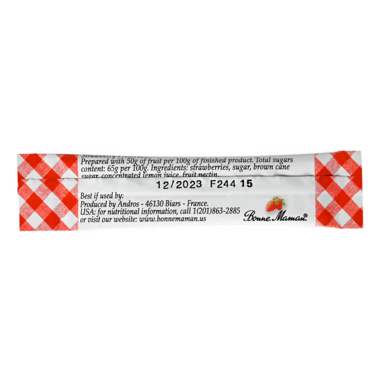Back side of a single serve packet of Bonne Maman strawberry preserves on a white background.