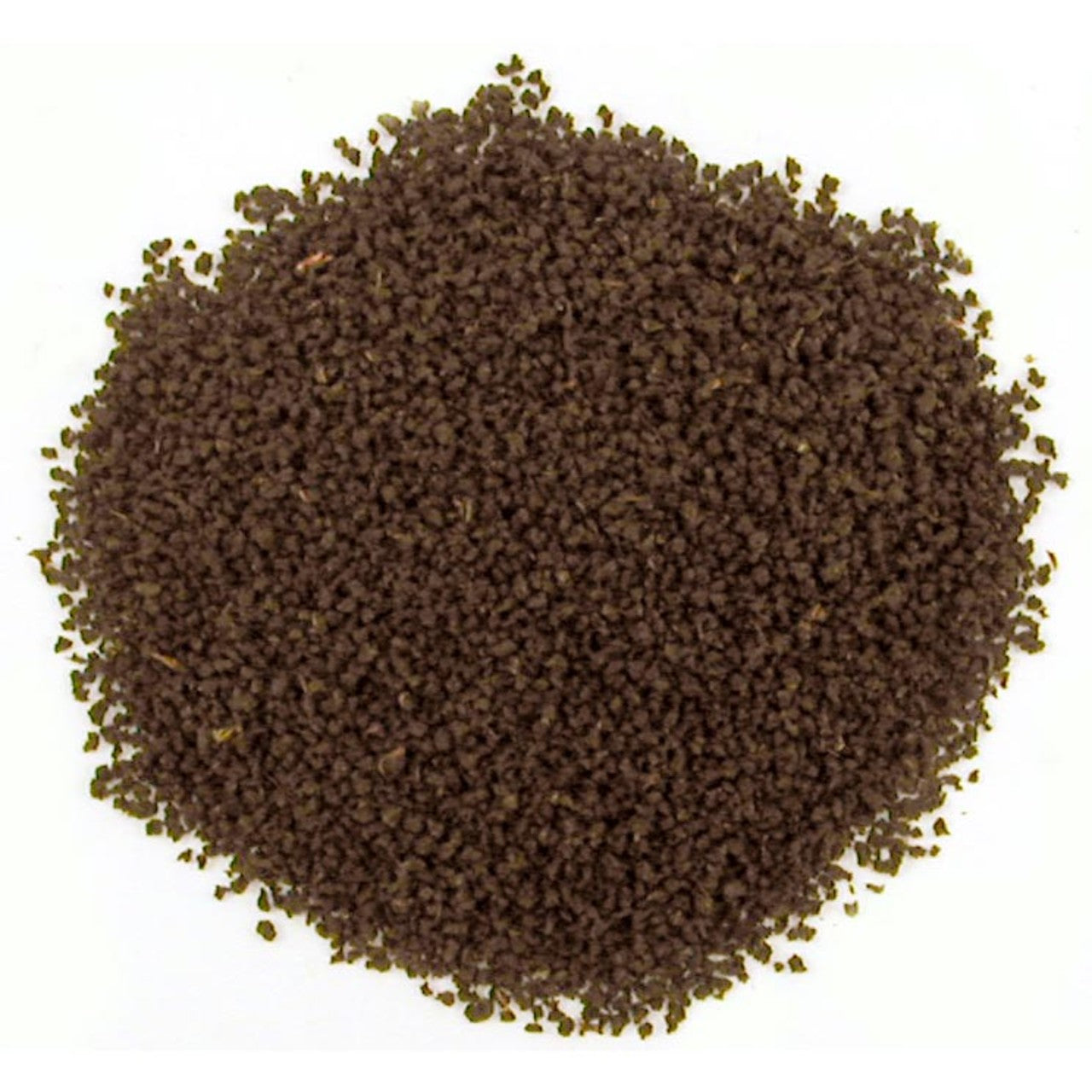 Dry black round shaped, ground tea leaves