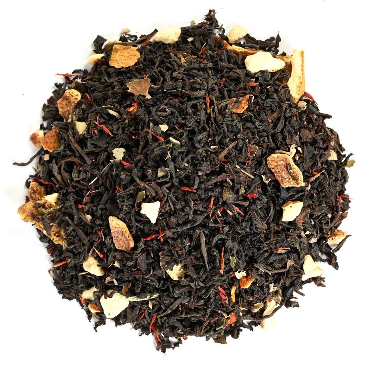 Black loose-leaf tea with citrus and spice on a white background