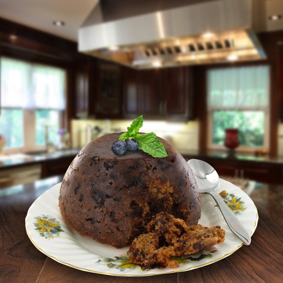 Christmas pudding desert on a plate super imposed on a kitchen backdrop