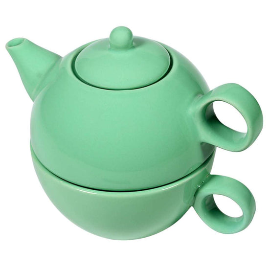 Sea foam green tea for one tea set with visible teapot and teacup stacked on a white background.