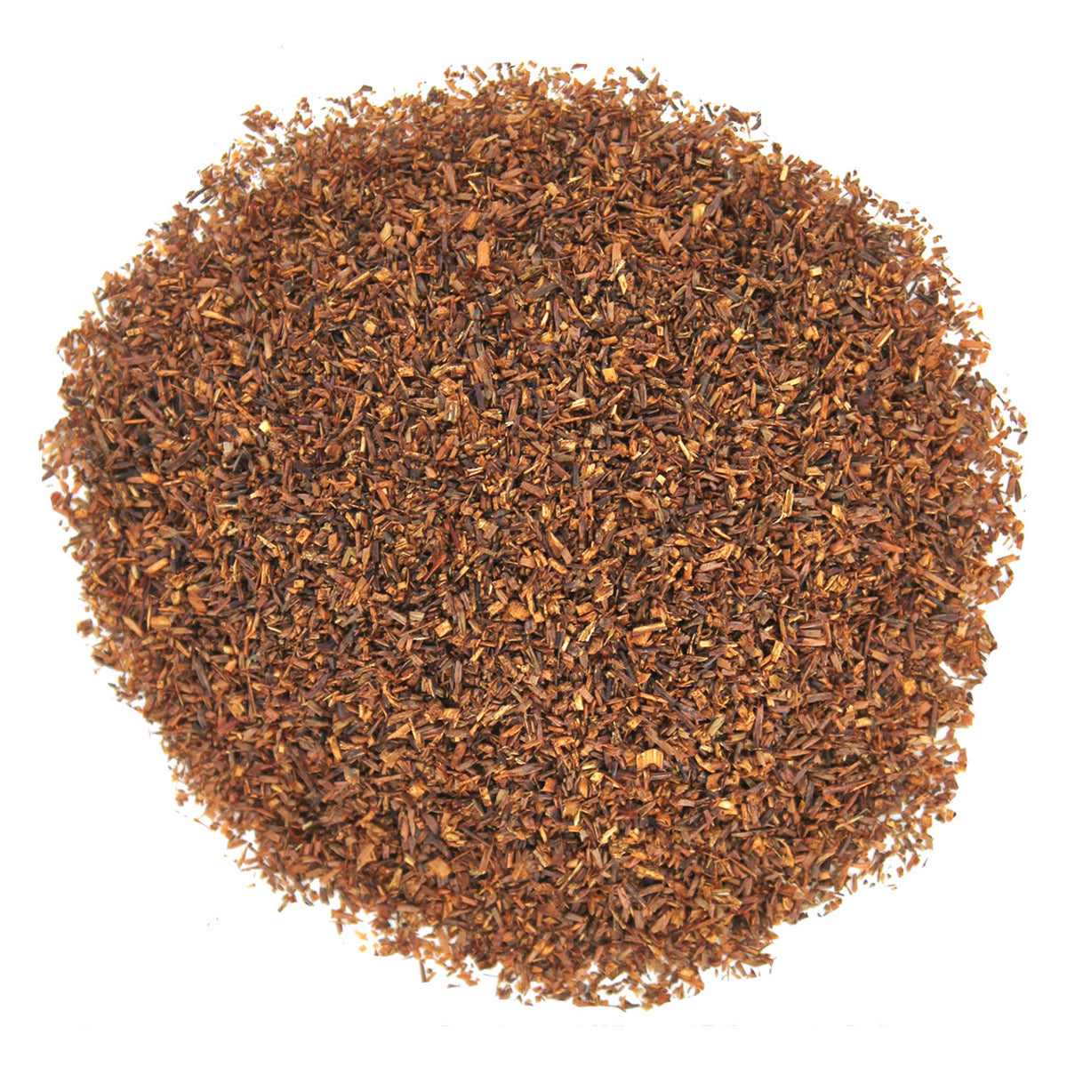 Close-up of a pile of dried brown tea leaves on a white background