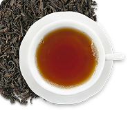 Image icon of dry loose-leaf tea in the upper corner underneath a white teacup and saucer filled with amber colored hot tea