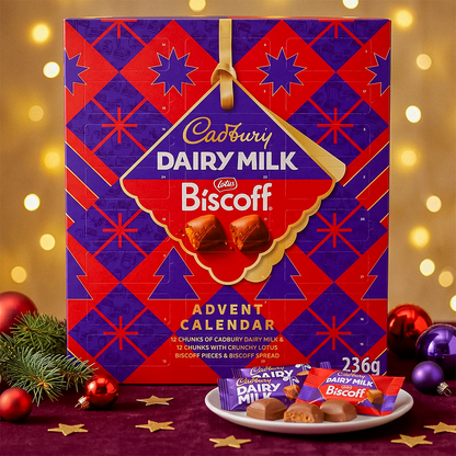 Cadbury Dairy Milk Biscoff Advent Calendar on a dark surface with festive decorations and a plate of chocolates
