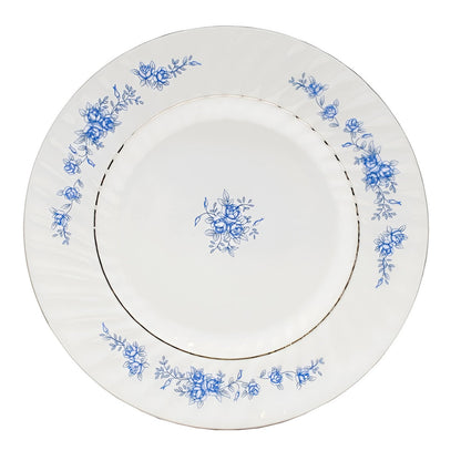 White plate with blue floral patterns on a white background