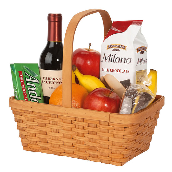 Gift basket with wine, fruits, and Milano chocolate on a white background