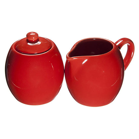 Red ceramic sugar and cream tea set on a white background