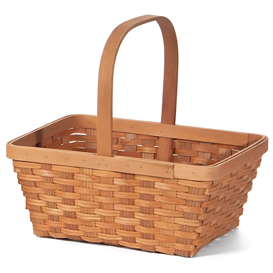 Wooden basket with handle on a white background