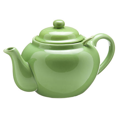 Green teapot on a white background