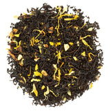 Loose leaf black tea with pieces of orange peel and natural flavoring, indicating a pumpkin spice flavor.