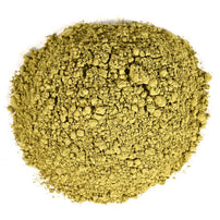 Matcha green tea powder on a white background