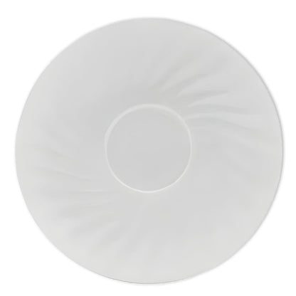 White porcelain saucer on a white background