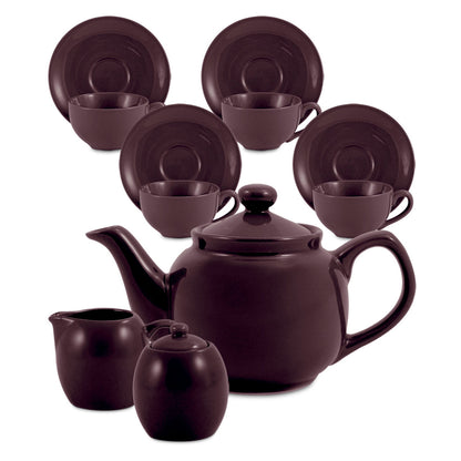 Brown ceramic teapot set with teacups and saucers on a white background