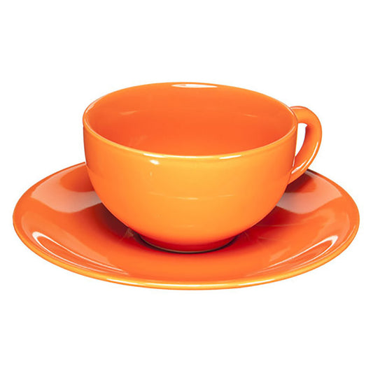 Orange cup and saucer set on a white background