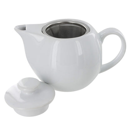White ceramic teapot with a metal infuser on a white background