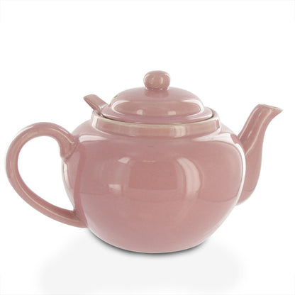 Pink teapot on a white background