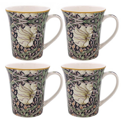 Set of four decorative mugs with floral patterns on a white background