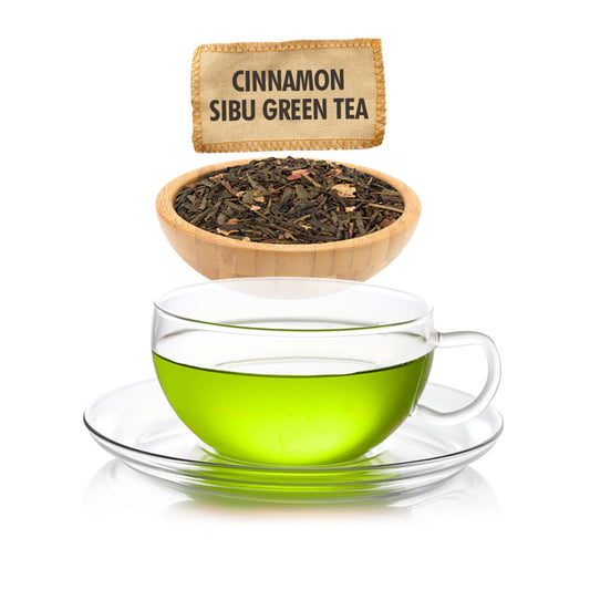 Cinnamon Sibu Green Tea packaging with tea leaves, a glass of vibrant green tea, and a tea bag on a white background.